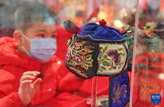 全国各地百顶虎头帽亮相江苏南通
